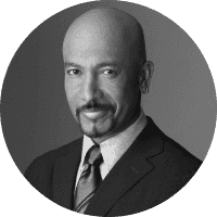 A headshot of Montel Williams smiling